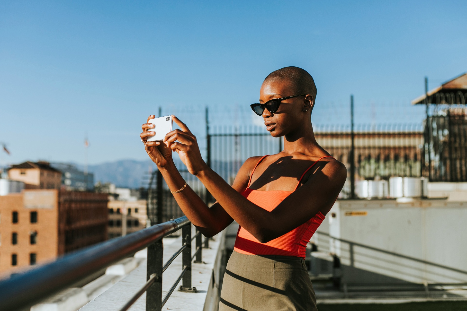 Person capturing data with smartphone